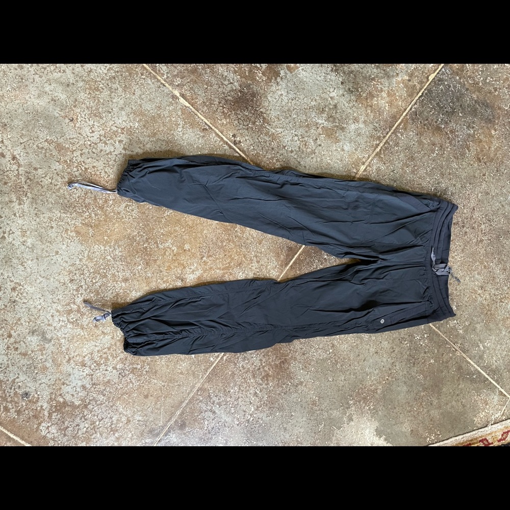 Lulu joggers. Size 12, like a parachute pant material. The tag is not on them
